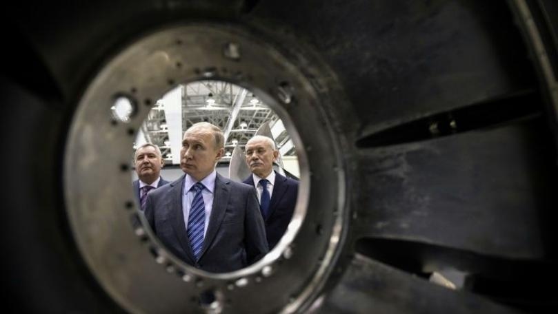 Kremlin says spies watching Russian scientists '24/7'