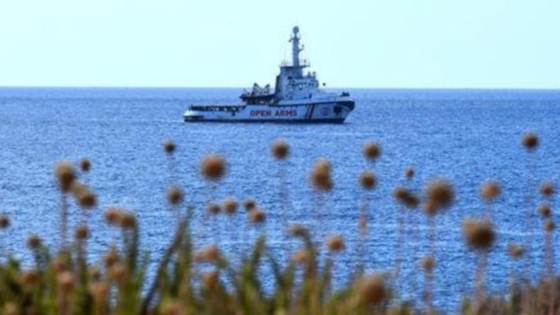 Charity ship says migrants' safety at risk; minors allowed to disembark