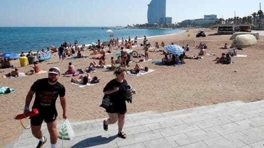 Beach in Barcelona evacuated after explosive device found in water
