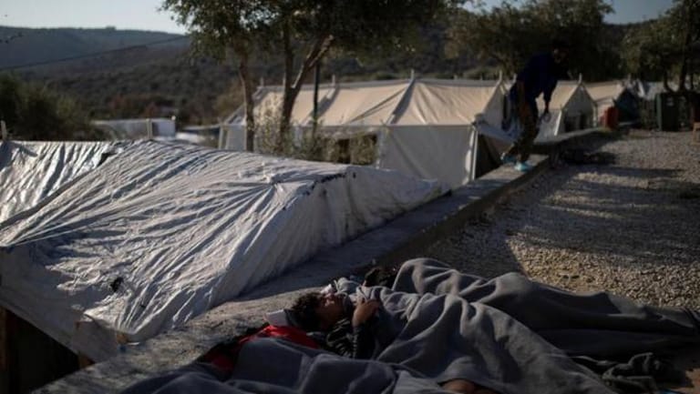 Greece moves hundreds of asylum-seekers from crowded island camp