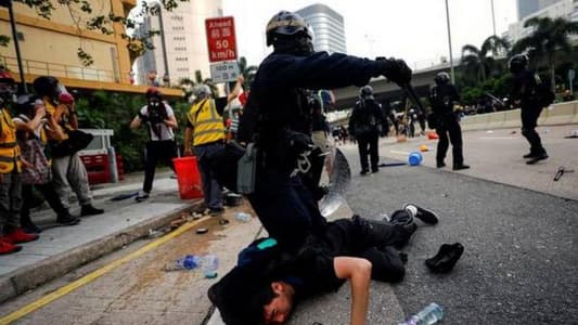 Hong Kong police fire tear gas to break up protesters