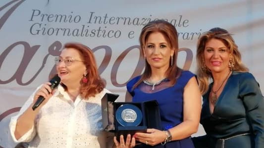 مديرة "الوطنية" تسلمت جائزة الادب والصحافة الدولية في بينيفنتو في إيطاليا