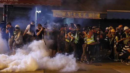 Hong Kong police fire tear gas to try to disperse protesters