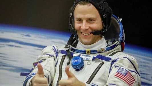 Putin bestows award for courage on U.S. astronaut who survived rocket failure