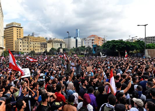 MTV correspondent: Protesters march around the Parliament through Banks street