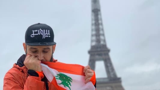 Lebanese gather at Eiffel Tower Square in Paris