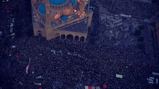 Photo: Large crowd of protesters filling downtown Beirut now