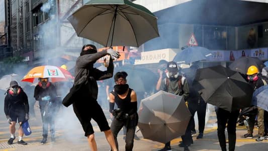 Thousands stage illegal Hong Kong march; shops, metro stations trashed