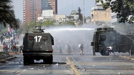 Chilean state of emergency extended around country after at least seven die in riots