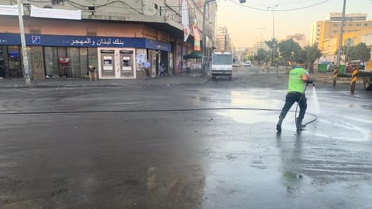 Volunteers clean up Tripoli streets after anti-government protests 