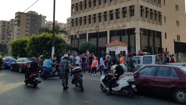 Protesters march from Al Nour Square to Central Bank in Tripoli