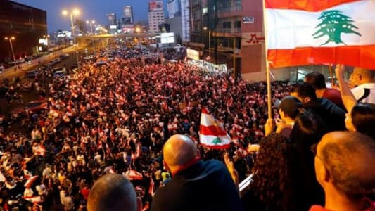 MTV correspondent: Jal el-Dib highway closed and tens of thousands of protesters raise Lebanese flags and chant slogans in the region