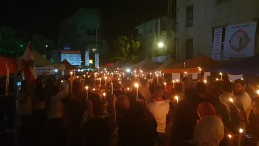 NNA: Sidon protesters organize a candlelight march in a "message of peace to all demonstrators in Lebanon"