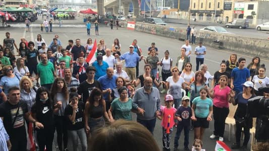 Photo: Protesters in Jal el-Dib pray for peace in Lebanon