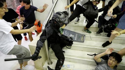 Hong Kong shopping mall clashes end in bloodshed