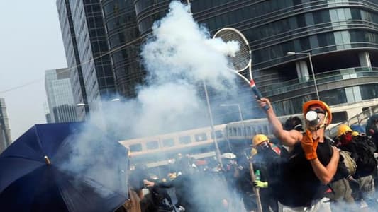 Hong Kong police fire tear gas in standoff with protesters