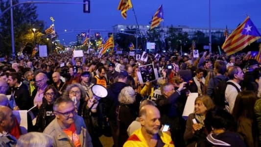 Spanish king greeted with protests in Catalonia