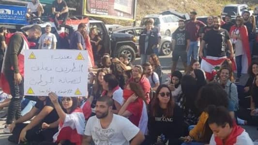 LAU students in Jbeil stage protest on road leading to university