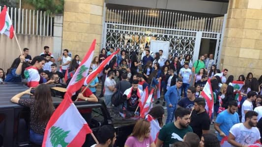 Students hold protest in front of Sagesse University in Furn El-Chebbak