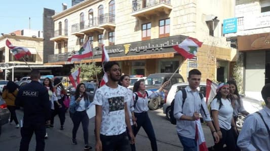 Students hold march in Jbeil market