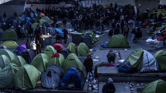 French police clear migrant tent camps in northern Paris