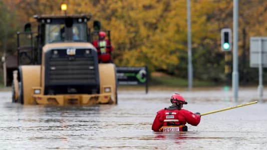 Residents told to leave homes as downpours bring floods across northern England