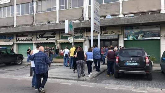 Protesters arrive at NSSF building in Jounieh