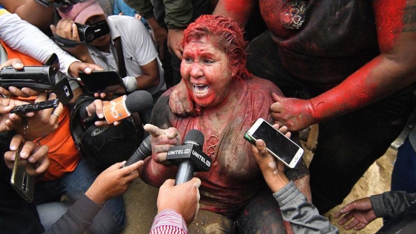 Bolivian Protesters Cut Off Mayor's Hair, Cover Her in Red Paint and Drag Her Through Streets