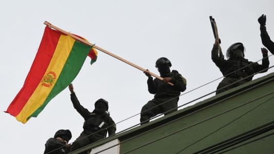 Bolivian police seen joining scattered anti-Morales protests