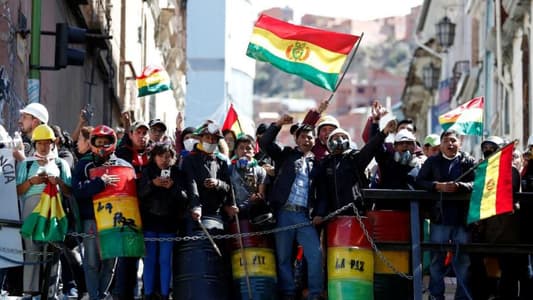 Bolivian government decries coup as some police join protests