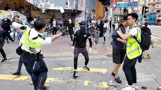 Hong Kong police officer shoots protester as violence flares