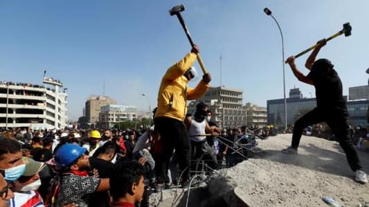 Protesters retake part of bridge in central Baghdad