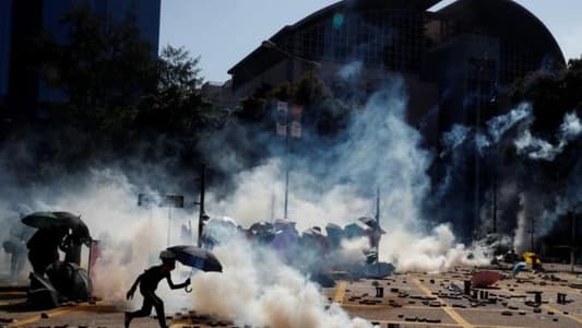 Hong Kong protesters fire bows and arrows from campus fortress