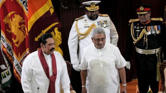 Sri Lanka's new leader appoints his PM brother as Finance Minister