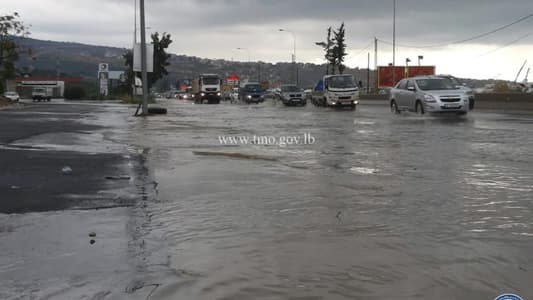 Rain water traps cars on Damour highway