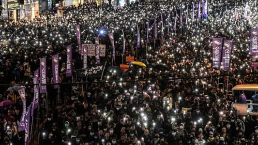 Peaceful Hong Kong march marred by fire outside court, police say