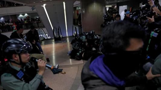 Hong Kong police fire tear gas to disperse Christmas Eve protesters