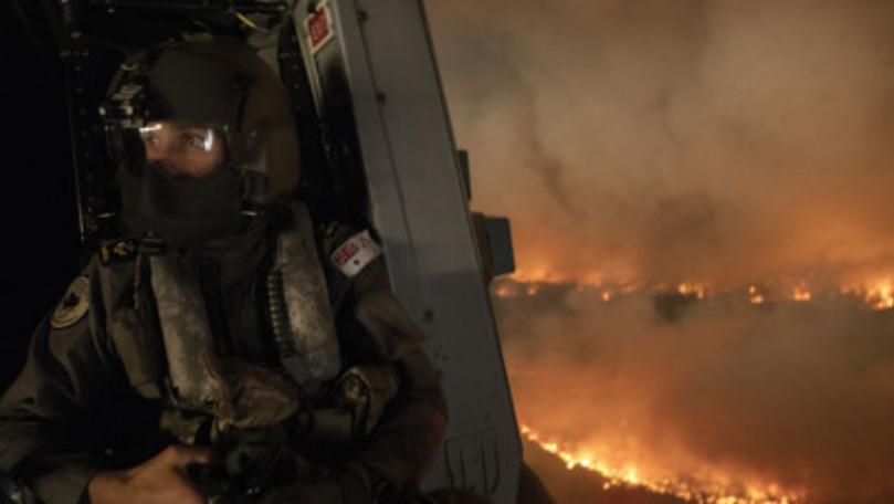 Residents, vacationers urged to leave Australian region as fire conditions worsen