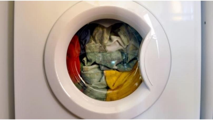 Woman Arrested After Son Found Inside Running Washing Machine