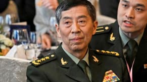 Former Chinese defence minister expelled from Communist Party