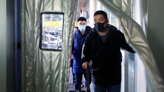Singapore extends coronavirus screening to all inbound China flights