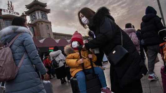 Residents of China's Wuhan rush to stock up as transport links severed