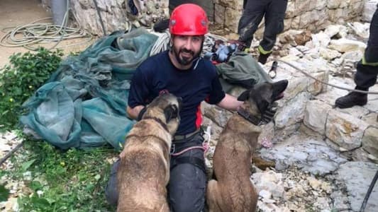 الدفاع المدني أنقذ كلبين علقا داخل بئر في غزير 