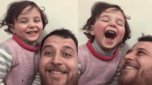 Syrian father, protecting daughter from trauma, turns sounds of war into a game