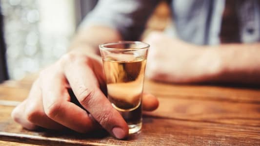 Here’s Why People Tap Their Glass on the Bar Before Taking a Shot