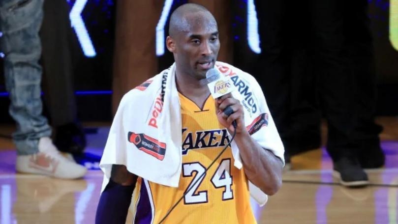 Bryant's Towel Fetches $33,000 at Auction