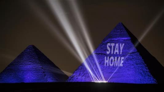 Photos: Egypt Lights Up Great Pyramids in Blue With 'Stay Home' Message