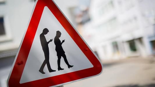 Japanese City May Ban Looking at Phones While Walking