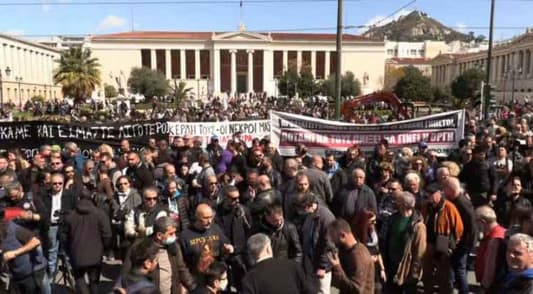 AFP: Train crash protests draw 23,000 in Athens