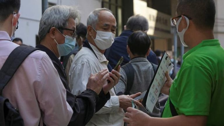 Hong Kong says Omicron has breached its strict COVID-19 restrictions